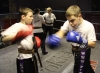 Leith Braiden and Jamie Phillips practicing their padwork techniques on day 4 of their Junior Black Belt grading.