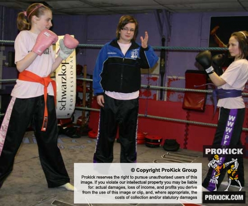 Rebekah as referee in the kids light contact sparring