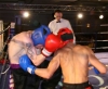 Kickboxing in Belfast - Hilton Hotel. Robert McNeil (N. Ireland) takes a nice body punch from Hakim Benhounette of (Switzerland)