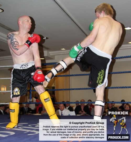 ProKick fighter Stuart Jess takes a hard low kick from Bo DelBressine from Malta.