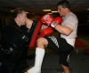 Alex Reid practises some knee work on the pads at the ProKick kickboxing gym in Belfast