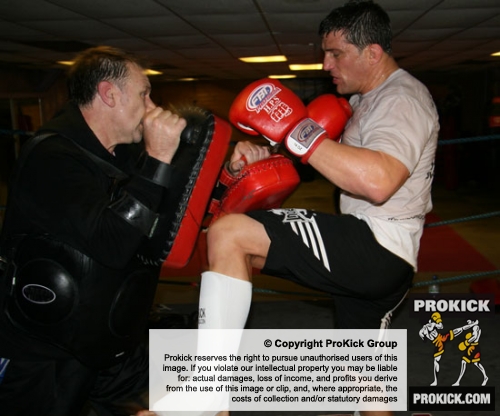 Alex Reid practises some knee work on the pads at the ProKick kickboxing gym in Belfast