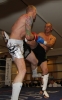 ProKick fighter Darren McMullan takes a hard roundhouse kick from opponent Barry Haberland from Holland.