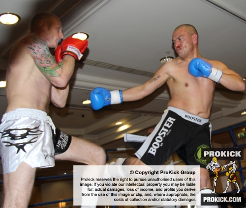 ProKick fighter Darren McMullan narrowly dodges a hard kick from opponent Barry Haberland from Holland.