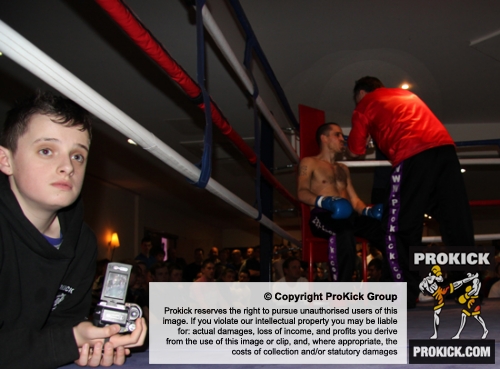 ProKick's Bailie McClinton looks on to the action in the ring on 25th February 2012 in Staines, Essex.