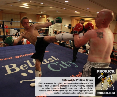 Maltese fighter Bo Desselbrine throws a high roundhouse kick to ProKick fighter Stuart Jess.