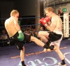 Bo Desselbrine (Holland) fires a Low-Kick to Gary Fullerton at Thai-Tanic event but it is well blocked