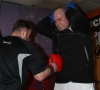 Nicolas Issenhart training on abdominal conditioning techniques with ProKick fighter Kris Hanna.