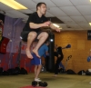 Adam Peel demonstrating the knees to chest technique on the final morning