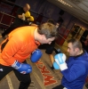 Boot campers Robert Buchanan and Russell Johnston body boxing in the ring on the final day of boot camp