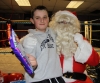 Bailie 'Clubber' McClinton receiving some well deserved chocolate from Santa Claus