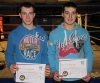 New ProKick Yellow Belts and brothers Jason and Gareth McAuley smile with pride after a hard grading day at ProKick HQ