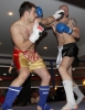 ProKick's Darren McMullan counters a hard jab from opponent Chris Lovell during their K1 style match on 25th February 2012 in Staines, Essex.