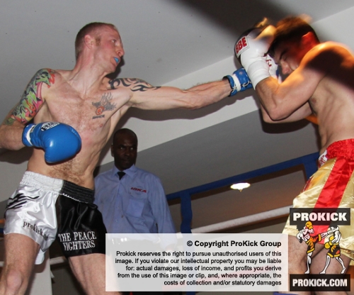 ProKick's Darren McMullan lands a hard jab on opponent Chris Lovell during their K1 style match on 25th February 2012 in Staines, Essex.