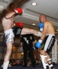 ProKick fighter Darren McMullan lands a hard front kick on opponent Barry Haberland from Holland.