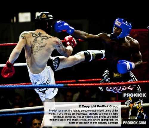 Darren McMullan trades some hard shots with Swiss opponent Sekou Diaby