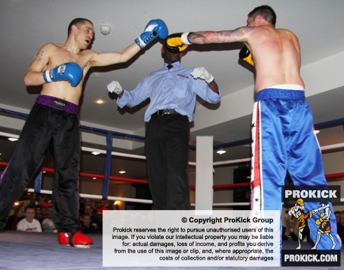 ProKick's Davy Foster touches gloves with opponent Scott Bryant on 25th February 2012 in Staines, Essex.
