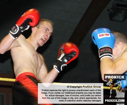 ProKick's Davy Foster covering up well as Swiss Aeschilmann takes the fight forward