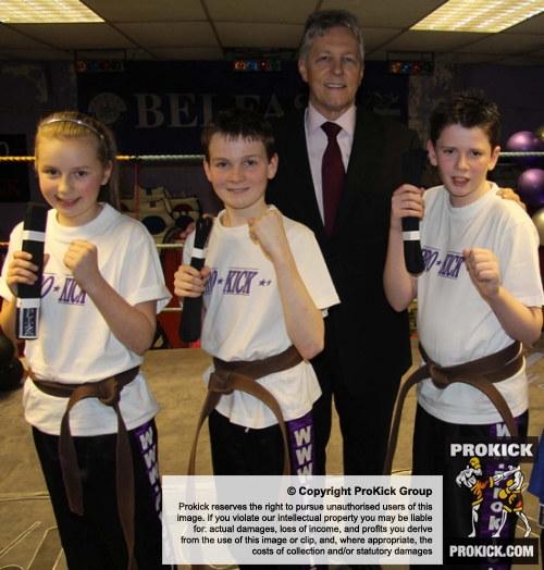Saskia Connolly, Jamie Phillips and Kyle Morrison show off their new Black Belts presented to them by Northern Ireland First Minister Peter Robinson.
