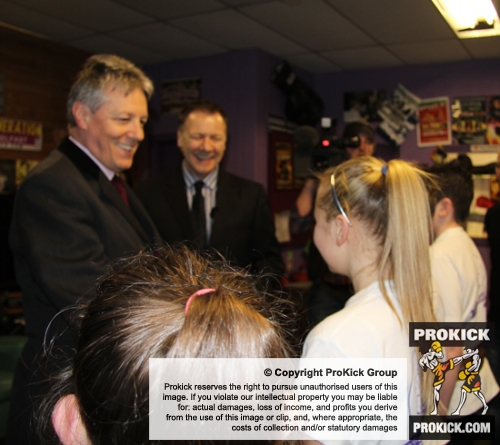 The new ProKick junior Black Belts and their parents greeting the First Minister on his visit to ProKick HQ