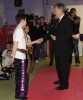 Northern Ireland First Minister Peter Robinson presenting 4 ProKick Kids their Black Belts at ProKick HQ.