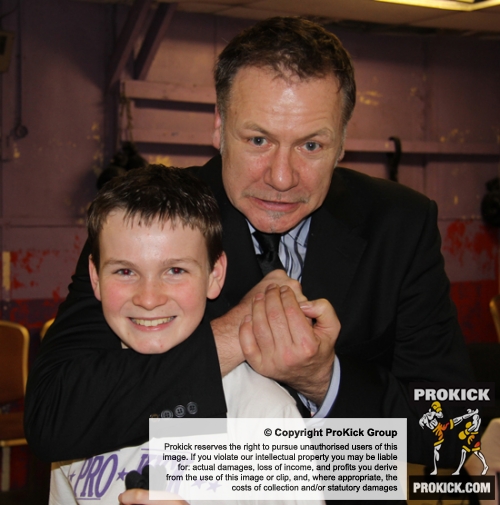 ProKick founder Billy Murray jokes around with new junior Black Belt Jamie Phillips during Northern Ireland First Minister, Peter Robinson's visit to ProKick HQ.