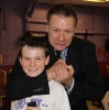ProKick founder Billy Murray jokes around with new junior Black Belt Jamie Phillips during Northern Ireland First Minister, Peter Robinson's visit to ProKick HQ.