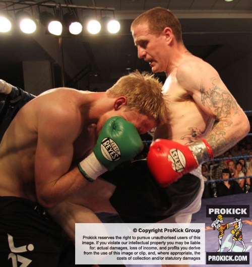 Action from Thai-Tanic Gary Fullerton lands hard knees to Dutch fighter Bo Desselbrine