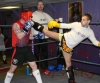 Gary Hamilton spars with the new beginners and shows them respect in the ring without going to hard - pictured with Connor McCnnville. Prokick instructor and WKN Irish super heavyweight champion ‘Big’ James Gillen looks on.
