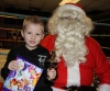 Cody Fullerton, son of ProKick fighter Gary Fullerton receiving some chocolate from Santa