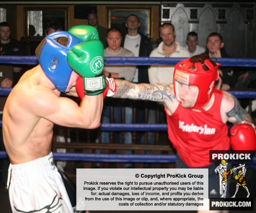ProKick's Karl McBlain covers up against a hard barrage of blows from Johnny McCabe during their boxing fight in Kilkenny