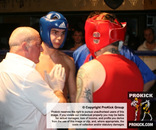 ProKick's Karl McBlain listens to the referee before his boxing fight with Johnny McCabe