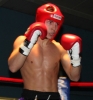 ProKick's Karl McBlain looking focused in the ring against England's Dean Petty