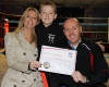 Proud Mum and Dad sitting beside new ProKick Green Belt Alex McGreevy Jr