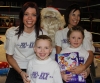 Santa with Karen Millar, son Joseph, niece Kirsten and one of his favourite helpers Pauline Goody