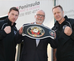 Local business puts the muscle behind the tussle, Pictured, regular supporter Mr Gary Withers from Peninsula Print & Design with Billy Murray (right) and champion Johnny Smith (left)