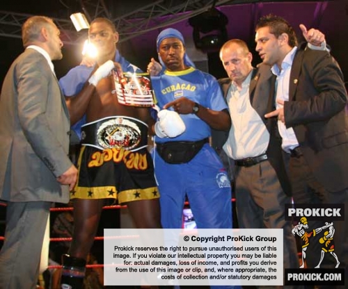 Rudsel Nisia a new belter after beating Charles Buttigieg  of Malta - pictured here with trainer Mr OJ  Cyntje and WKN men Mr Emil Irimia Mr. Osman Yigin and Mr. Toussaint Andarelli