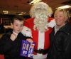 Carter Stewart, ProKick junior Green Belt with Mum Liz meeting Santa Claus