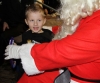 Santa Claus gives out selection boxes to the wave of junior kickboxers