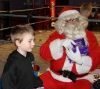 Santa Claus gives out a selection box to David Hagan