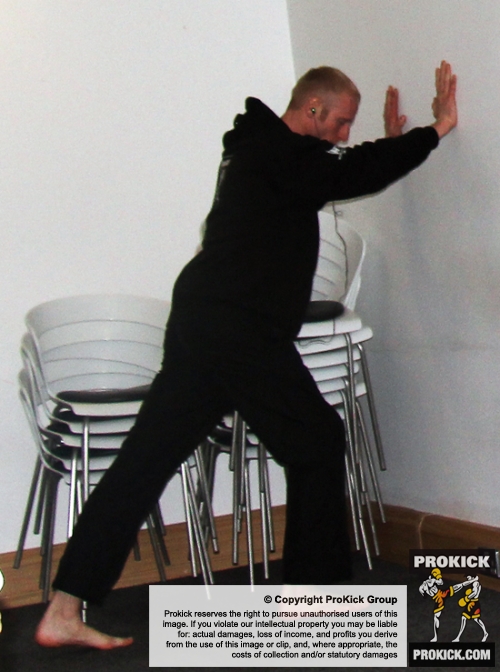 ProKick's Darren McMullan stretching out before his K1 style match on 25th February 2012 in Staines, Essex.