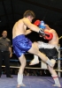 ProKick battler Stuart Jess covers up against some hard shots from opponent Loic Jeannin