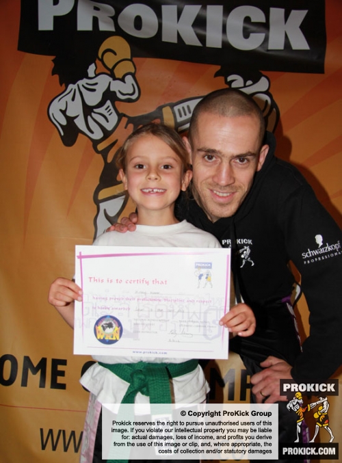 Davy Foster with daughter Kirsty age 7 after she was awarded her blue belt in the style of ProKick kickboxing, That's my girl, said Kickboxing instructor Foster