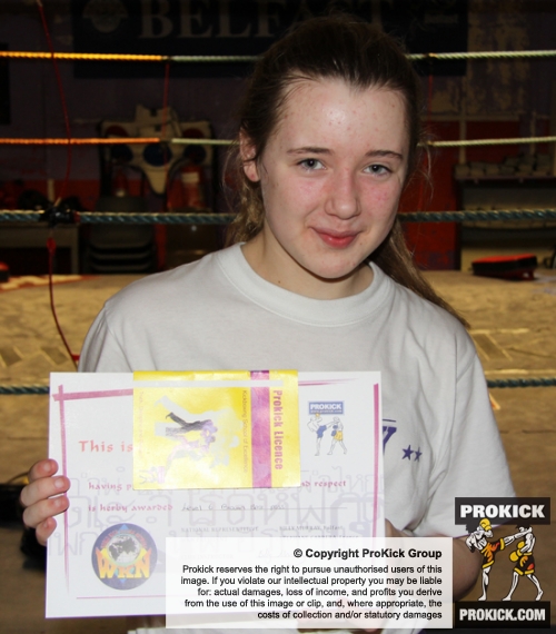 New ProKick Junior Brown Belt Aimee McKee smiling with pride after a hard grading day at ProKick HQ