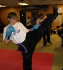 ProKick Senior member Anne Gallagher demonstrating high kicking techniques at the ProKick HQ Adult Grading