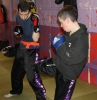 ProKick junior fighter Bailie McClinton stayed behind after his own grading to put some of the Adult senior members through their paces