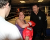 One of ProKick's beginner kickboxing enthusiasts working hard with a member of the senior class.