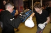 One of ProKick's beginner kickboxing enthusiasts working hard with a member of the senior class.