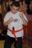 ProKick junior Orange Belt Carter Stewart working hard for his junior Green belt grading.