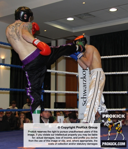 ProKick fighter Darren McMullan lands a powerful roundhouse against Swiss opponent Jeremy Jossi